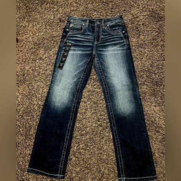 Salvage jeans size 14 from buckle